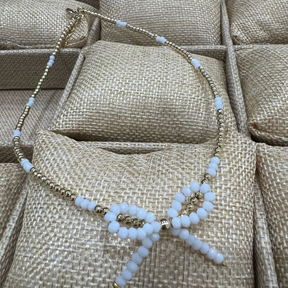 Gold over silver gold beaded and stone bow necklace